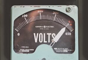 Antique Voltage Meter demonstrating power surges
